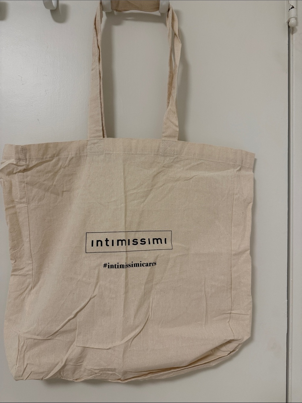 intimissimi Beige Canvas Tote with Black Logo